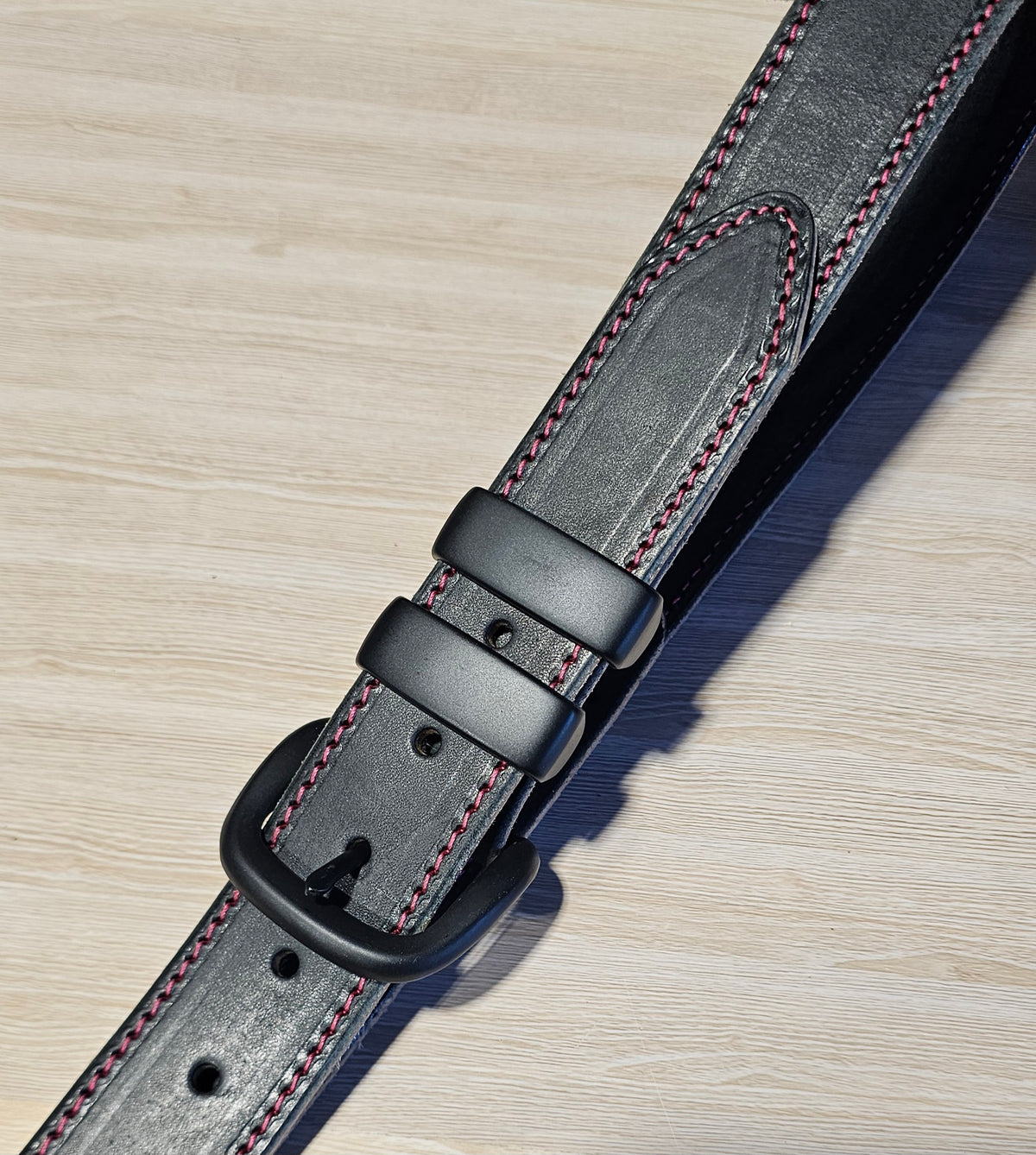 Hot pink stitched 32mm black belt for NBCF